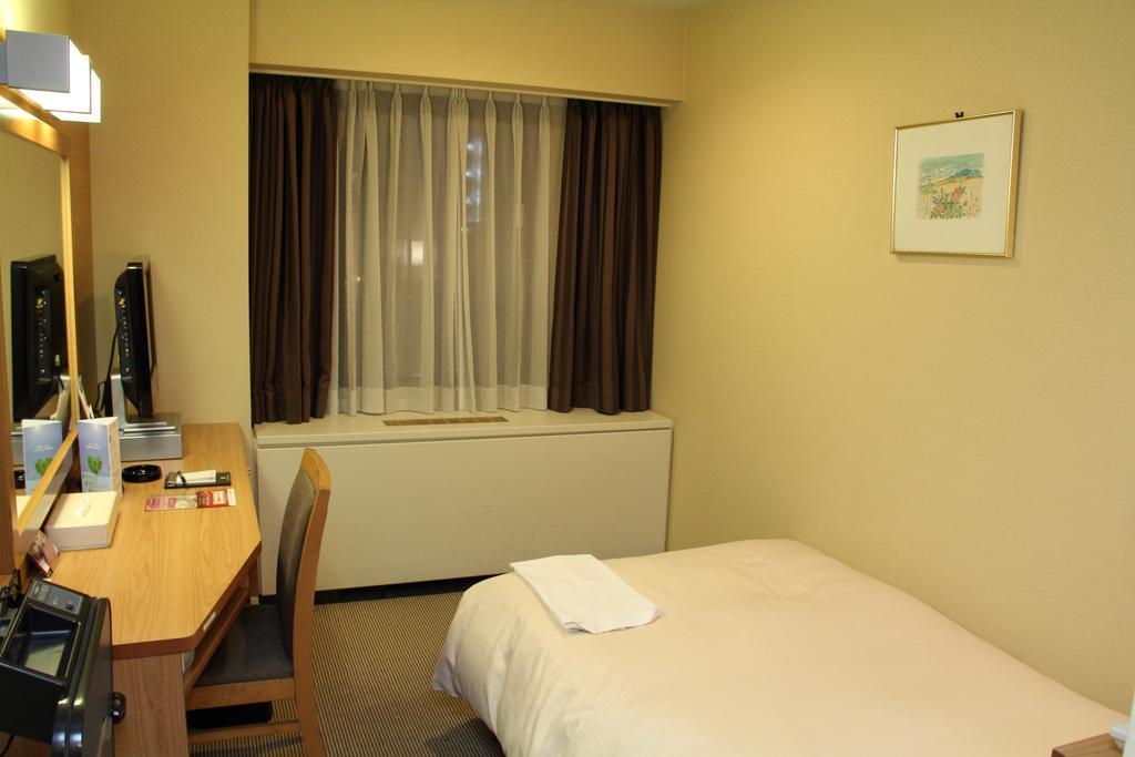 Hotel Sunroute New Sapporo Habitación foto