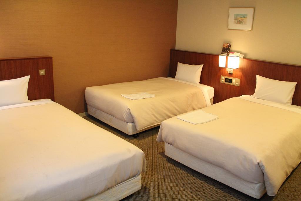 Hotel Sunroute New Sapporo Habitación foto